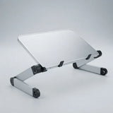 Silver aluminum laptop stand with black rubber feet and adjustable joints, shown on a light gray studio background.