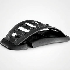 Black footrest with textured surface on a white background