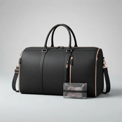 A black leather duffel bag with rose gold trim and handles, shown on a light gray background next to a small clear zippered pouch.