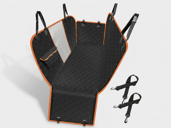A black quilted pet car seat cover with bright orange trim and black adjustable straps, shown laid open on a light gray background with two extra straps beside it.