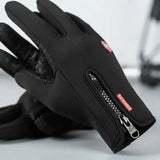 Black winter gloves with a zipper pocket and textured grip on the fingers, featuring a small red brand tag.