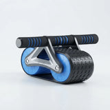 An ab roller exercise wheel with textured black handles, blue textured inner wheels, and a silver metal support frame, shown on a light gray background.