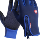 A pair of blue and black winter gloves with a textured grip on the palms, a zippered wrist opening, and a red circular logo patch on a white background.