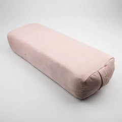A dusty pink fabric yoga support pillow, also known as a bolster or strapless bolster, shown on a neutral light gray background. The brand name 'yebib' is subtly embroidered on the lower right corner.