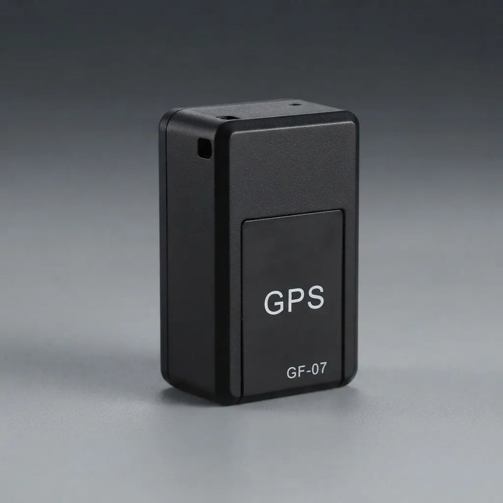 A small black rectangular GPS device labeled 'GPS' and 'GF-07' in white text, photographed on a smooth gray studio background.