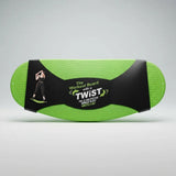 A green and black balance board exercise pad labeled 'The Workout Board with TWIST' on a light gray studio background.