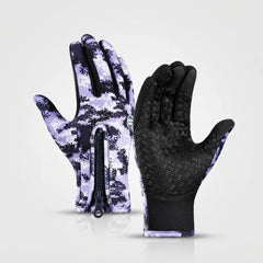 A pair of winter gloves shown front and back on a light gray studio background. One glove is shown palm-up with a black and light purple digital camouflage pattern, and the other is shown palm-down with a black textured grip surface.