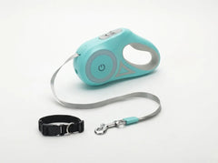 A turquoise retractable pet leash with a gray strap and a separate black collar, displayed on a clean white background.