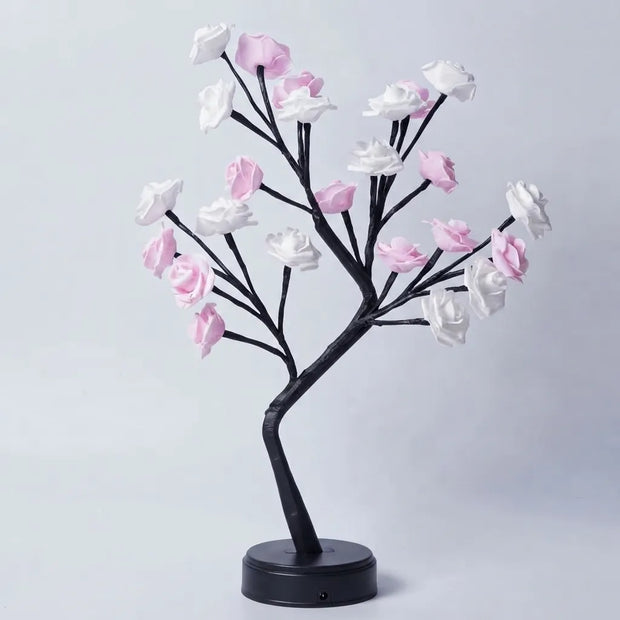 Decorative tree with pink and white flowers on a light gray background