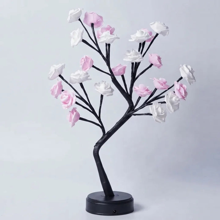 Decorative tree with pink and white flowers on a light gray background